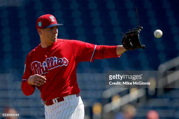 Jerad Eickhoff of the Philadelphia Phillies reacts after hitting Darren Miller of the University of Tampa in the first inning during the Spring...