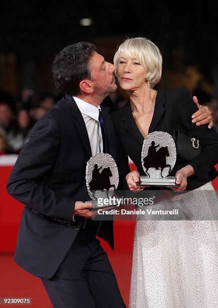 Actors Sergio Castellitto and Helen Mirren pose with their awards during the Official Awards Photocall on Day 9 of the 4th International Rome Film...