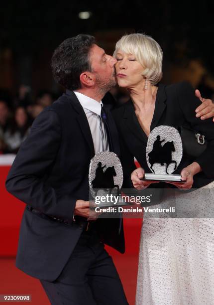 Actors Sergio Castellitto and Helen Mirren pose with their awards during the Official Awards Photocall on Day 9 of the 4th International Rome Film...