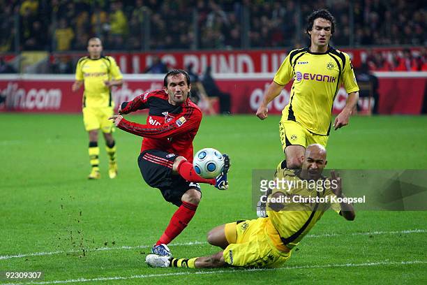 Dede of Dormtund blocks a shot of Theofanis Gekas of Leverkusen during the Bundesliga match between Bayer Leverkusen and Borussia Dortmund at the...
