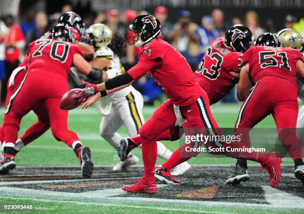 Matt Ryan of the Atlanta Falcons tosses the ball against the New Orleans Saints at Mercedes-Benz Stadium on December 7, 2017 in Atlanta, Georgia.