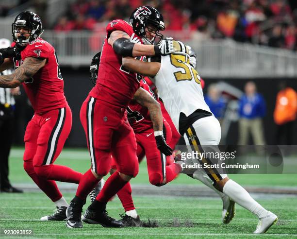 Ryan Schraeder of the Atlanta Falcons blocks against Craig Robertson of the New Orleans Saints at Mercedes-Benz Stadium on December 7, 2017 in...
