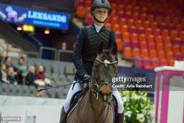 Swedish equestrian Emilia Liljegren on Max rides in the semifinal competition of the Young Riders Cup during the Gothenburg Horse Show in...