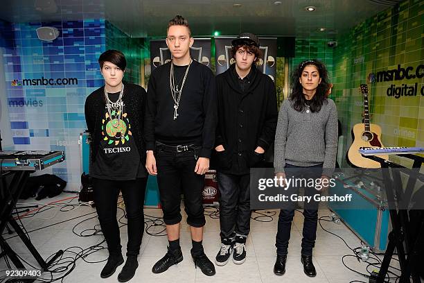 Musicians Romy Madley Croft, Oliver Sim, Jamie Smith and Baria Qureshi of the band TheXX pose for pictures after performing at the NBC Experience...
