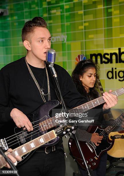Musicians Oliver Sim and Baria Qureshi of the band The XX perform at the NBC Experience Store on October 23, 2009 in New York City.