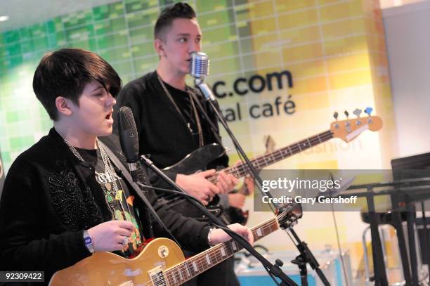 Musicians Romy Madley Croft and Oliver Sim of the band The XX perform at the NBC Experience Store on October 23, 2009 in New York City.