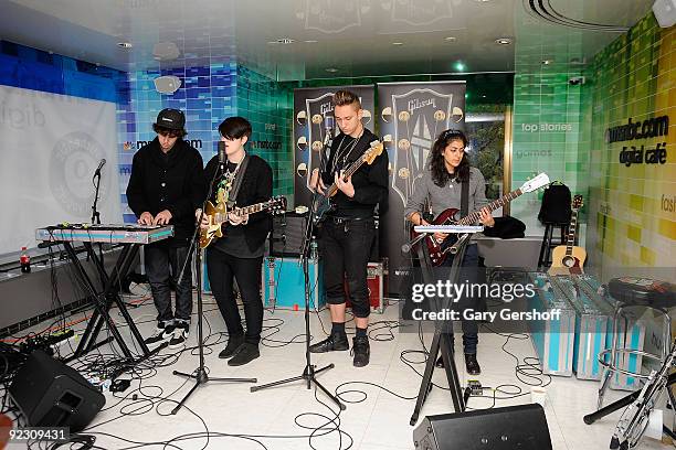 Musicians Jamie Smith, Romy Madley Croft, Oliver Sim, and Baria Qureshi of the band, The XX perform at the NBC Experience Store on October 23, 2009...