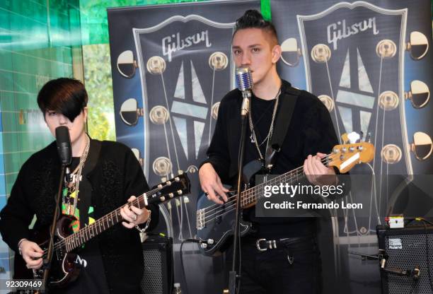 From the band The XX, Romy Madley Croft and Oliver Sim perform at the NBC Experience Store on October 23, 2009 in New York City.