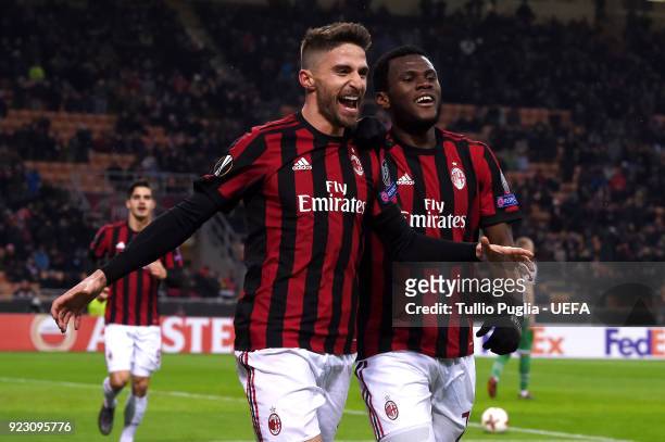 Fabio Borini of AC Milan celebrates with team mate Franck Kessie after scoring the opening goal during UEFA Europa League Round of 32 match between...
