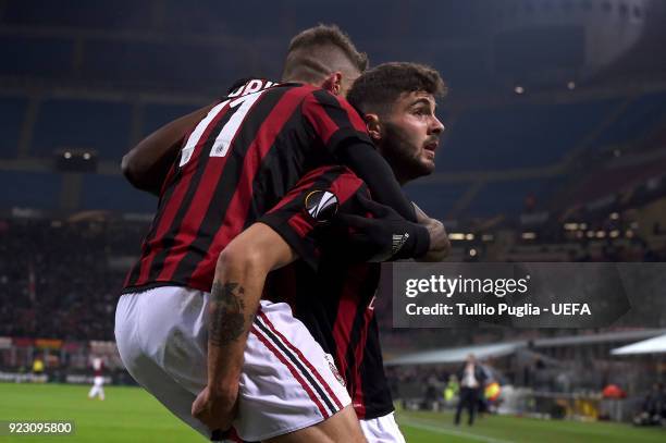 Fabio Borini of AC Milan celebrates with team mate Patrick Cutrone after scoring the opening goal during UEFA Europa League Round of 32 match between...