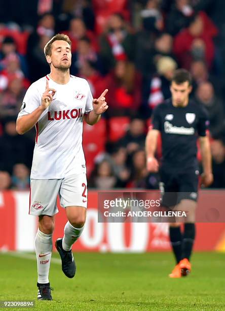 Spartak Moscow's Russian defender Dmitri Kombarov celebrates after scoring his team's first goal during the Europa League Round of 32 second leg...