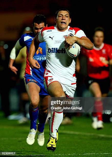 Ryan Hall of England breaks away to score a try during the Gillette Four Nations International match between England and France at Keepmoat Stadium...