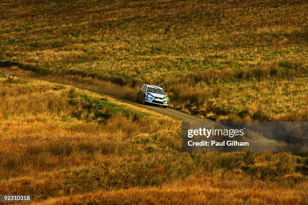 Matthew Wilson of Great Britain and Stobart VK M-Sport Ford Rally Team drives the Ford Focus RS WRC 08 during stage two of the Wales Rally GB at...