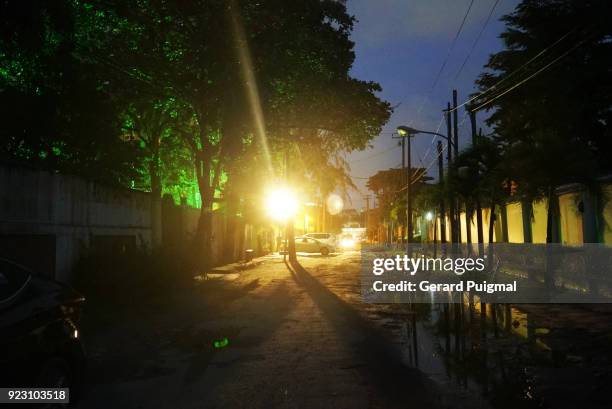 street in lagos at night - lagos stock-fotos und bilder