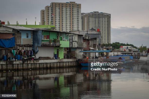 Slum area near luxury apartments in Jakarta, Indonesia on February 22, 2018. N the past two decades, the gap between the richest and the rest in...