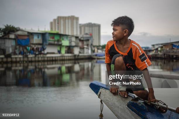 Little boy playing at slum area, Jakarta, Indonesia on February 22, 2018. In the past two decades, the gap between the richest and the rest in...