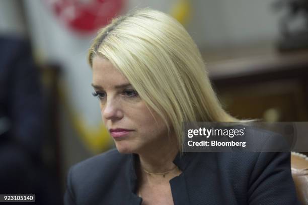 Pam Bondi, Florida attorney general, listens during a meeting with U.S. President Donald Trump, not pictured, and local and state officials on school...