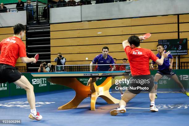 Xin XU and Long MA from China face Alexandre Cassin and Emmanuel Lebesson from France on the first day of ITTF Team Table Tennis World Cup on...