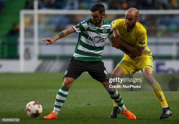 Sporting's midfielder Bruno Fernandes vies with Astana's midfielder Ivan Maevski from Bielorussia during the UEFA Europa League football match...