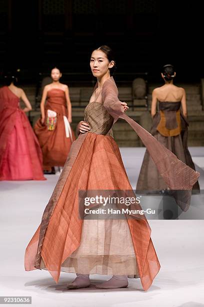 Model walks down the catwalk during the South Korean Traditional Costume 'HanBok' fashion show on October 23, 2006 in Seoul, South Korea.