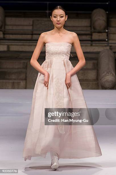 Model walks down the catwalk during the South Korean Traditional Costume 'HanBok' fashion show on October 23, 2009 in Seoul, South Korea.