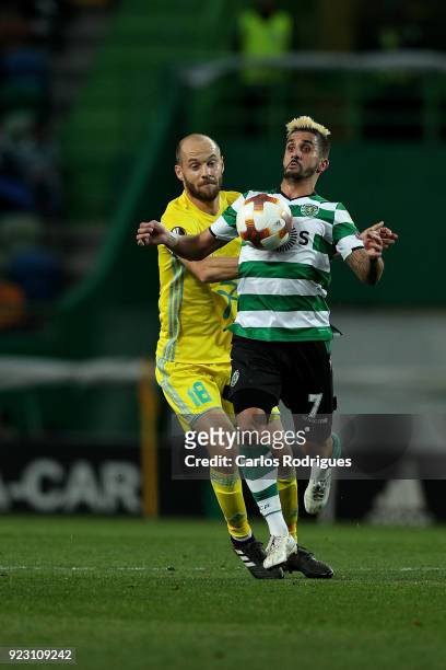 Astana midfielder Ivan Maevski from Bielorussia vies with Sporting CP forward Ruben Ribeiro from Portugal for the ball possession during UEFA Europa...