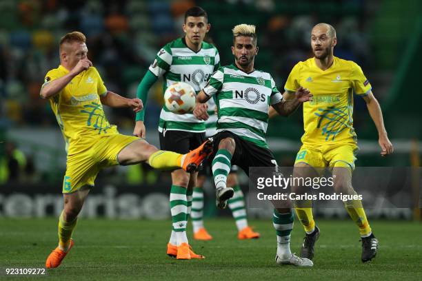 Astana midfielder Laszlo Tleinheisler from Hungary vies with Sporting CP forward Ruben Ribeiro from Portugal for the ball possession during UEFA...
