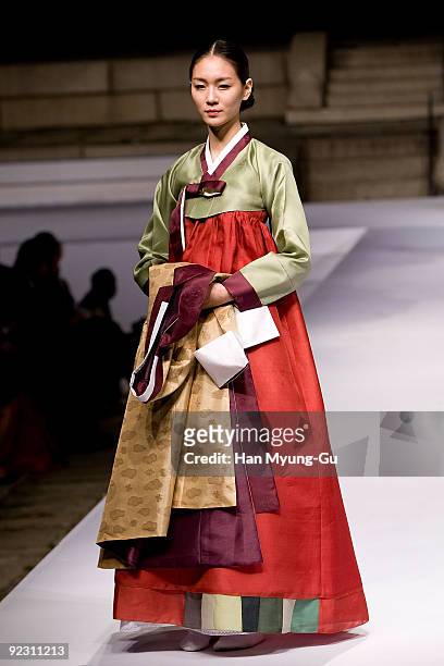 Models walk the runway at the South Korean Traditional Costume 'HanBok' fashion show on October 23, 2009 in Seoul, South Korea.