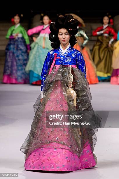 Models walk the runway at the South Korean Traditional Costume 'HanBok' fashion show on October 23, 2009 in Seoul, South Korea.