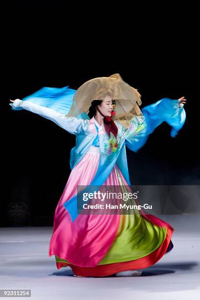 Models walk the runway at the South Korean Traditional Costume 'HanBok' fashion show on October 23, 2009 in Seoul, South Korea.