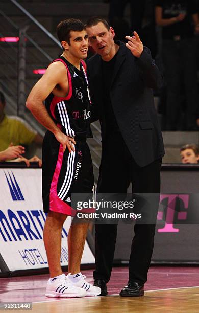 Head coach Michael Koch speaks to his player Jared Jordan of Baskets during the Beko Basketball Bundesliga game between Telekom Baskets and Phoenix...