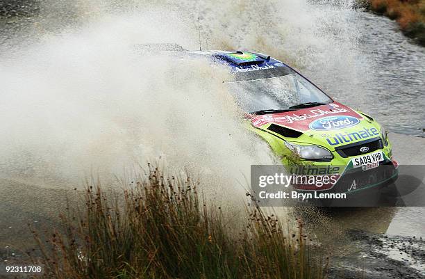 Mikko Hirvonen of Finland and the BP Ford Abu Dhabi World Rally Team in action during stage two of the Wales Rally GB at Sweet Lamb on October 23,...