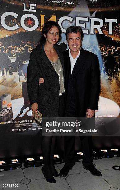 Actor Francois Cluzet and actress Valerie Bonneton attend the premiere of the Radu Mihaileanu film "Le Concert" at Theatre du Chatelet on October 23,...