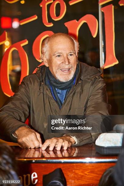 Singer Jimmy Buffett is photographed for New York Times on December 5, 2017 handing out burgers at Marquis Theater in New York City.