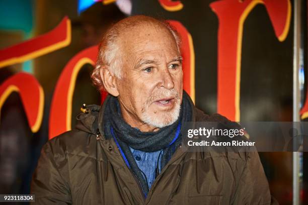 Singer Jimmy Buffett is photographed for New York Times on December 5, 2017 handing out burgers at Marquis Theater in New York City.