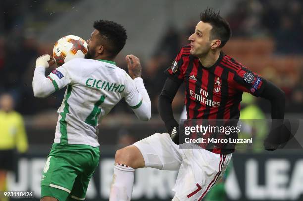 Nikola Kalinic of AC Milanis competes for the ball with Cicinho of Ludogorets Razgrad during UEFA Europa League Round of 32 match between AC Milan...