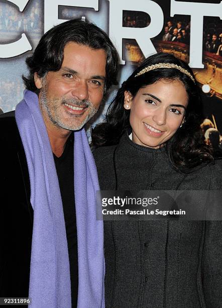Director Christophe Baratier and an unidentified companion attend the premiere of the Radu Mihaileanu film "Le Concert" at Theatre du Chatelet on...