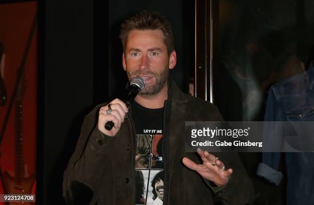 Frontman Chad Kroeger of Nickelback speaks during a memorabilia case dedication ahead of the band's five-night "Feed the Machine" residency at The...