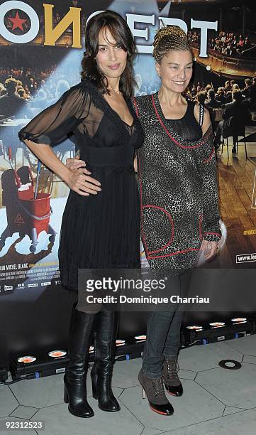 Actresses Dolores Chaplin and Elli Medeiros attend the premiere of ''Le Concert'' at the Theatre du Chatelet on October 23, 2009 in Paris, France.