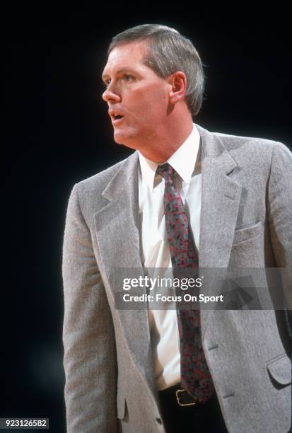 Head coach Jim O'Brien of the Boston College Eagles looks on against the Georgetown Hoyas during an NCAA College basketball game circa 1991 at the...