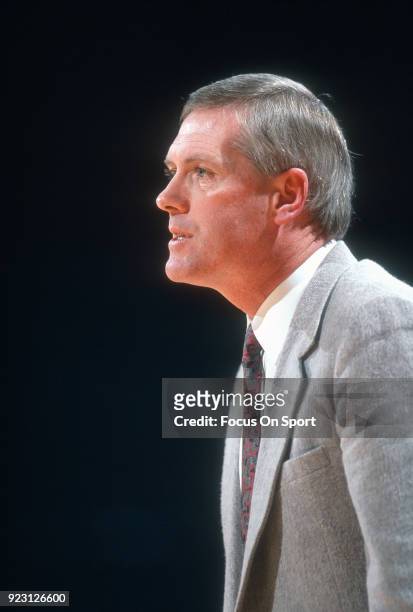 Head coach Jim O'Brien of the Boston College Eagles looks on against the Georgetown Hoyas during an NCAA College basketball game circa 1991 at the...