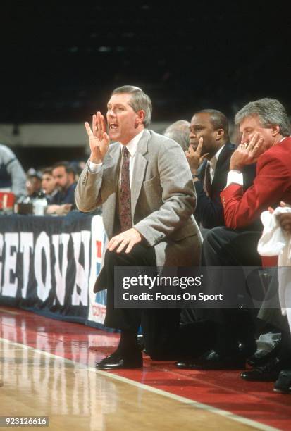 Head coach Jim O'Brien of the Boston College Eagles looks on against the Georgetown Hoyas during an NCAA College basketball game circa 1991 at the...