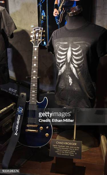 Nickelback frontman Chad Kroeger's Gibson Longhorn guitar and Diesel shirt are displayed in a memorabilia case after it was unveiled ahead of the...