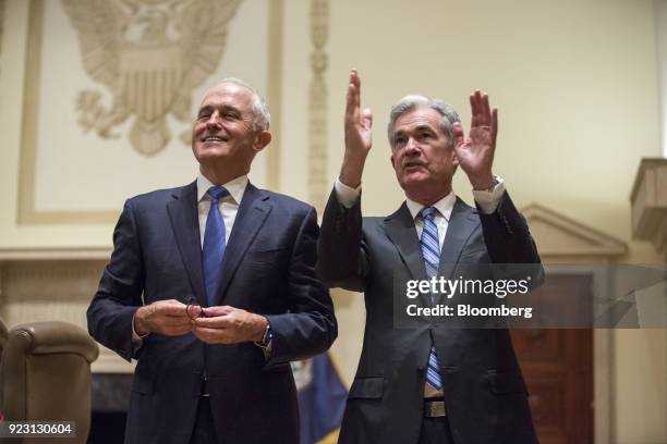 Malcolm Turnbull, Australia's prime minister, right, and Jerome Powell, chairman of the U.S. Federal Reserve, view a map on display during a meeting...