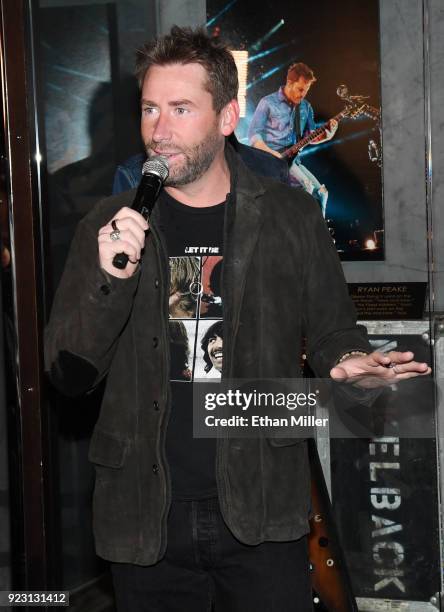 Frontman Chad Kroeger of Nickelback speaks during a memorabilia case dedication ahead of the band's five-night "Feed the Machine" residency at The...