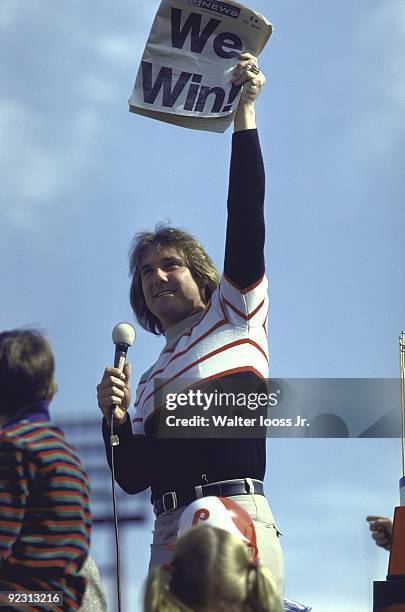 World Series: Philadelphia Phillies Tug McGraw making speech and holding Daily News with WE WIN headline during Victory Rally at JFK Stadium....