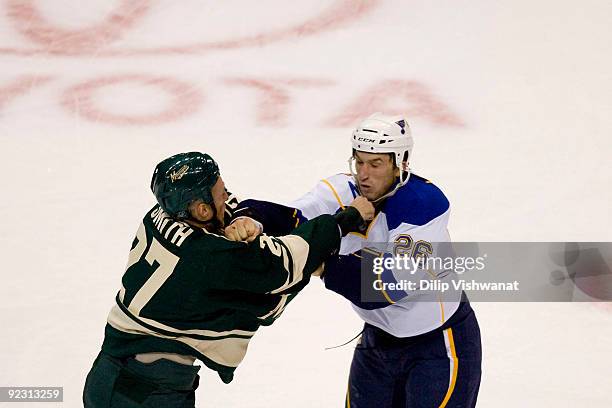 Nathan Smith of the Minnesota Wild fights BJ Crombeen of the St. Louis Blues at the Scottrade Center on October 23, 2009 in St. Louis, Missouri.