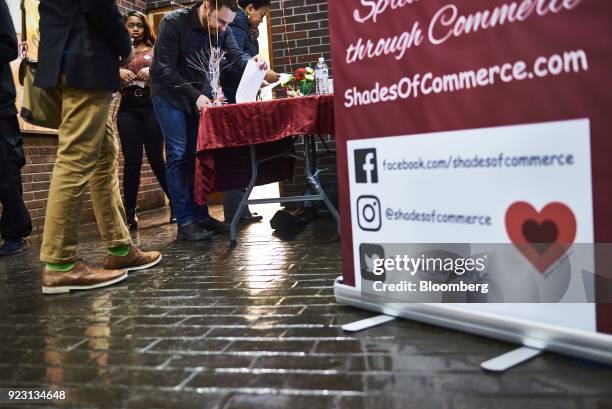 Job seekers sign in during a Shades of Commerce Career Fair in the Brooklyn borough of New York, U.S., on Saturday, Feb. 17, 2018. The latest initial...