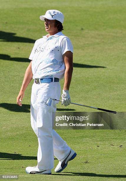 Rickie Fowler watches his second shot on the 18th hole during the second round of the Frys.com Open at Grayhawk Golf Club on October 23, 2009 in...