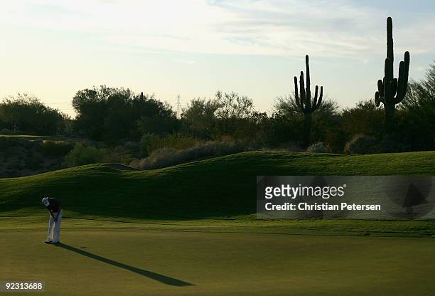 Aron Price of Australia putts on the eighth hole green during the second round of the Frys.com Open at Grayhawk Golf Club on October 23, 2009 in...